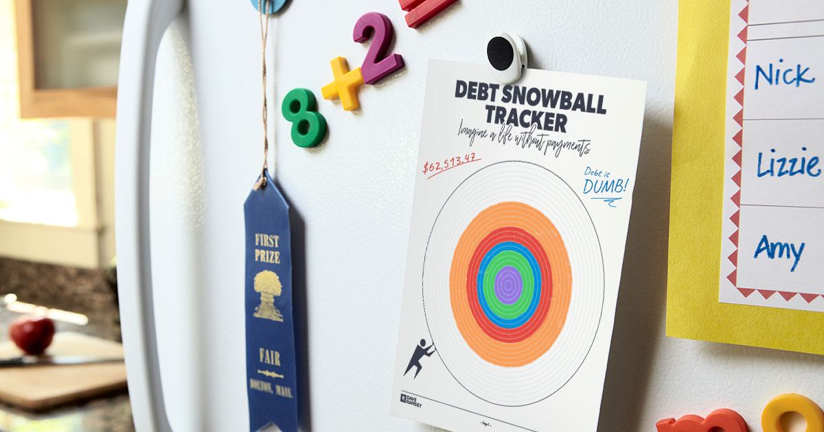 Debt Snowball Tracker posted note hanging on a fridge